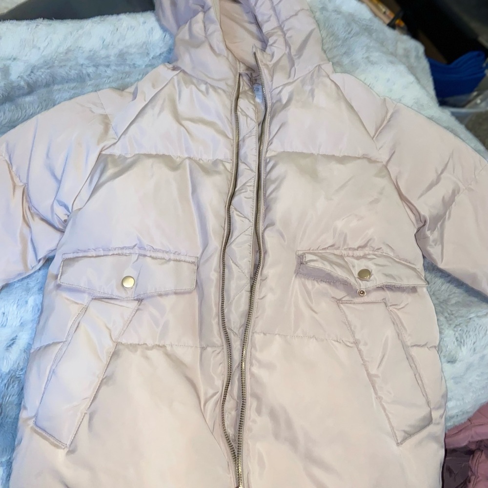 Pale pink puffer coat